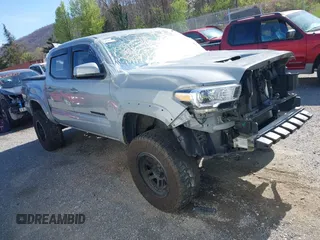 2020 Toyota Tacoma SR5 z VIN 5TFCZ5AN5LX229019, wystawiony jako IAAI lot #41907694 z przebiegiem 79 355 mil mil oraz . Historia ofert i sprzedaży dostępna na DreamBid. Obrazek 1.