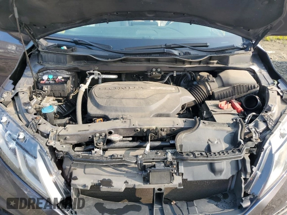 2019 Honda Odyssey EX with VIN 5FNRL6H58KB013889, listed as a Copart auction lot 57077025 with 126,467 mi miles and Salvage title. Bid and sale history available at DreamBid. Image 12.