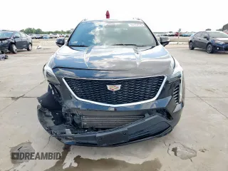 2020 Cadillac XT4 FWD Sport z VIN 1GYFZER47LF146488, wystawiony jako Copart lot #53174175 z przebiegiem 66 820 mil mil oraz Szkoda całkowita • Salvage title. Historia ofert i sprzedaży dostępna na DreamBid. Obrazek 5.