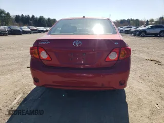 2010 Toyota Corolla with VIN 1NXBU4EE2AZ275061, listed as a Copart auction lot 52596765 with 113,833 mi miles and Salvage Title. Bid and sale history available at DreamBid. Image 6.