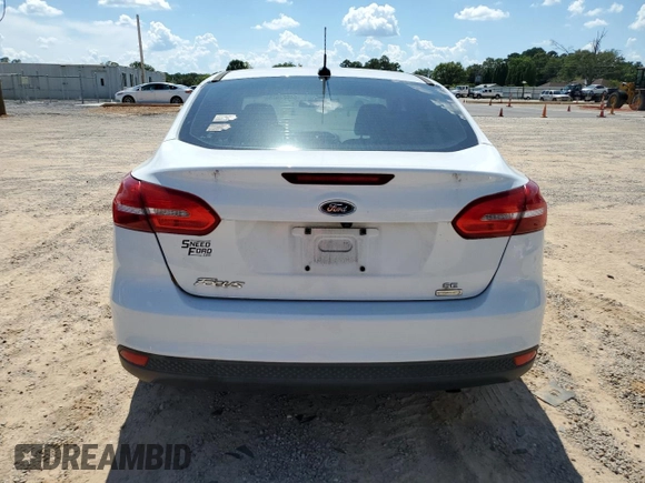 2017 Ford Focus SE with VIN 1FADP3FE9HL348123, listed as a Copart auction lot 64624965 with 58,650 mi miles and Clean title. Bid and sale history available at DreamBid. Image 6.