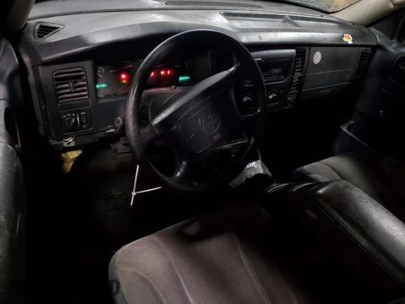 2002 Dodge Dakota with VIN 1B7FL16X32S557570, listed as a Copart auction lot 88974295 with 201,791 mi miles and Salvage Title. Bid and sale history available at carsss.com. Image 8.