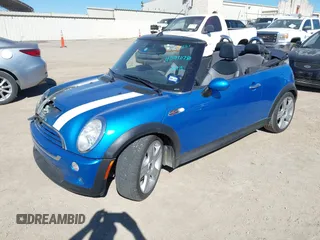 2007 MINI Convertible S with VIN WMWRH33547TL94374, listed as a IAAI auction lot 40910780 with 45,162 mi miles and . Bid and sale history available at DreamBid. Image 2.