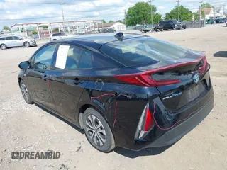2020 Toyota Prius LE with VIN JTDKARFP3L3156910, listed as a IAAI auction lot 42467826 with 103,285 mi miles and . Bid and sale history available at DreamBid. Image 3.