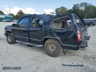 1999 Chevrolet Tahoe Z71 with VIN 1GNEK13R1XJ380316, listed as a Copart auction lot 68505524 with 242,542 mi miles and Salvage Title. Bid and sale history available at carsss.com. Image 2.