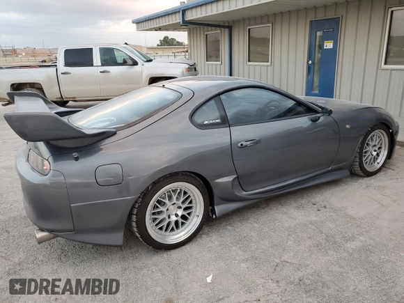 1996 Toyota Supra с VIN JZA800034162, выставлен на аукционе Copart как лот 80046394 с пробегом 86 285 миль миль и Чистый • Clean title. История ставок и продаж доступна на DreamBid. Изображение 3.