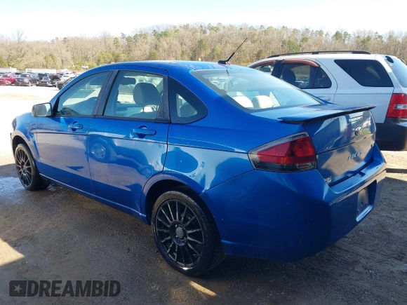 2010 Ford Focus SES with VIN 1FAHP3GN8AW165221, listed as a IAAI auction lot 41864224 with 148,785 mi miles. Bid and sale history available at carsss.com. Image 3.