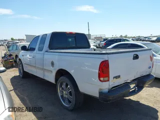 1997 Ford F-150 with VIN 1FTDX1764VKB98042, listed as a IAAI auction lot 42442450 with 203,620 mi miles and . Bid and sale history available at DreamBid. Image 3.