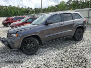 2018 Jeep Grand Cherokee Laredo E with VIN 1C4RJEAG3JC110487, listed as a Copart auction lot 54700795 with 135,665 mi miles and Salvage title. Bid and sale history available at DreamBid. Image 1.