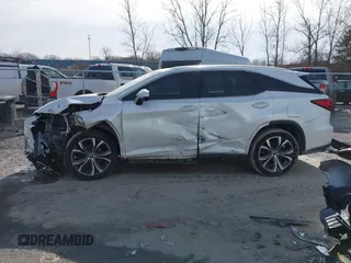 2018 Lexus RX 350L Premium z VIN JTJDZKCAXJ2005488, wystawiony jako IAAI lot #41509043 z przebiegiem 151 814 mil mil oraz . Historia ofert i sprzedaży dostępna na DreamBid. Obrazek 14.