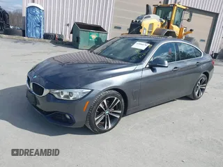 2016 BMW 4 Series 428i xDrive with VIN WBA4C9C56GG140427, listed as a IAAI auction lot 41886670 with 94,426 mi miles and . Bid and sale history available at carsss.com. Image 2.