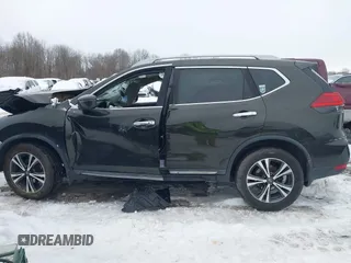 2017 Nissan Rogue SL with VIN 5N1AT2MT0HC813372, listed as a IAAI auction lot 41215661 with 109,101 mi miles and . Bid and sale history available at DreamBid. Image 14.