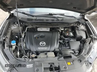 2016 Mazda CX-5 Grand Touring z VIN JM3KE2DY7G0735355, wystawiony jako Copart lot #49438285 z przebiegiem 132 731 mil mil oraz Szkoda całkowita • Salvage title. Historia ofert i sprzedaży dostępna na DreamBid. Obrazek 12.