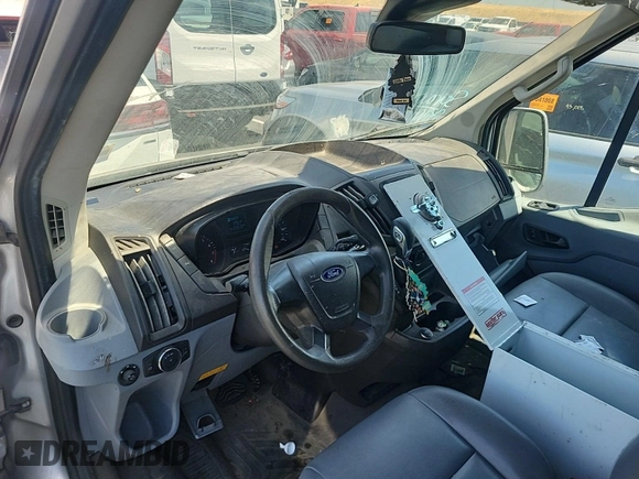 2017 Ford Transit Cargo with VIN 1FTYE1CM0HKB43622, listed as a IAAI auction lot 42670548 with 202,530 mi miles and . Bid and sale history available at DreamBid. Image 37.