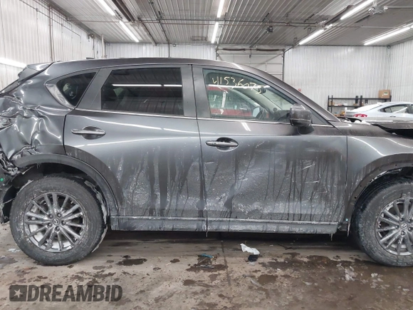 2020 Mazda CX-5 Touring with VIN JM3KFBCM0L0843242, listed as a IAAI auction lot 41536075 with 31,849 mi miles. Bid and sale history available at carsss.com. Image 13.
