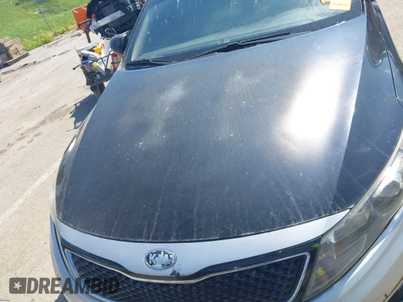 2013 Kia Optima LX z VIN KNAGM4A76D5302789, wystawiony jako IAAI lot #42244688 z przebiegiem Nie podano mil oraz . Historia ofert i sprzedaży dostępna na DreamBid. Obrazek 10.