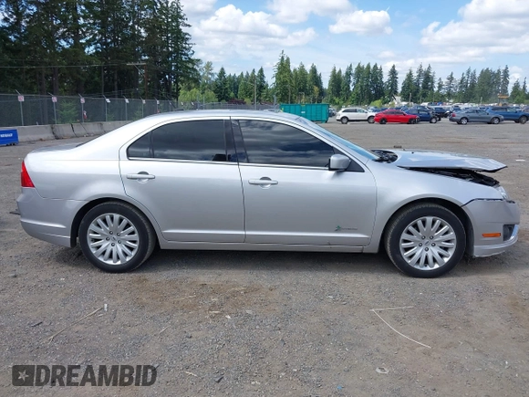2012 Ford Fusion Hybrid with VIN 3FADP0L35CR440051, listed as a IAAI auction lot 42644284 with 89,087 mi miles and . Bid and sale history available at DreamBid. Image 13.