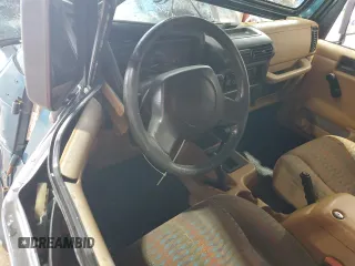 1997 Jeep Wrangler Sport with VIN 1J4FY19SXVP537075, listed as a Copart auction lot 61389915 with Not provided miles and Salvage title. Bid and sale history available at DreamBid. Image 8.