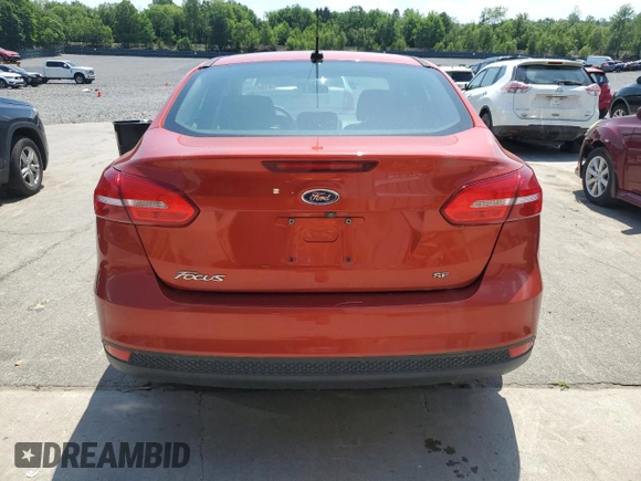 2018 Ford Focus SE z VIN 1FADP3F2XJL254750, wystawiony jako Copart lot #61907545 z przebiegiem 71 328 mil mil oraz Szkoda całkowita • Salvage title. Historia ofert i sprzedaży dostępna na DreamBid. Obrazek 6.