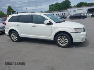2017 Dodge Journey SXT with VIN 3C4PDCBG4HT572573, listed as a IAAI auction lot 42036006 with 209,854 mi miles and . Bid and sale history available at DreamBid. Image 13.