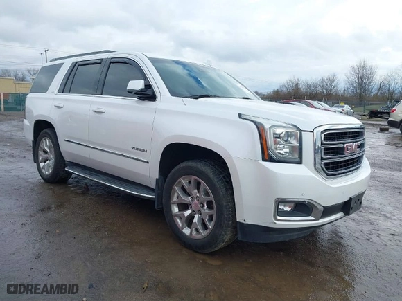 2016 GMC Yukon SLT with VIN 1GKS2BKCXGR195010, listed as a IAAI auction lot 41226537 with 130,919 mi miles. Bid and sale history available at carsss.com. Image 1.