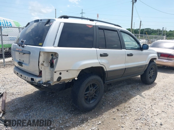 2002 Jeep Grand Cherokee Laredo with VIN 1J4GX48S32C288387, listed as a IAAI auction lot 42212249 with 151,028 mi miles and . Bid and sale history available at DreamBid. Image 4.