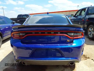 2019 Dodge Charger Scat Pack with VIN 2C3CDXGJ8KH588905, listed as a IAAI auction lot 42211811 with 50,298 mi miles and . Bid and sale history available at carsss.com. Image 17.