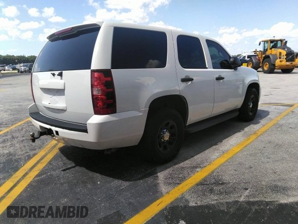 2011 Chevrolet Tahoe Commercial with VIN 1GNLC2E02BR325621, listed as a IAAI auction lot 41866389 with 167,693 mi miles and . Bid and sale history available at DreamBid. Image 4.