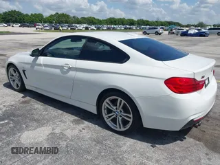 2014 BMW 4 Series 428i с VIN WBA3N3C58EF712765, выставлен на аукционе IAAI как лот 42470456 с пробегом 73 901 миль миль и . История ставок и продаж доступна на DreamBid. Изображение 3.