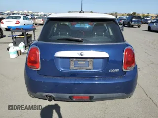 2014 MINI Hardtop with VIN WMWXM5C52ET932677, listed as a Copart auction lot 53486865 with 189,039 mi miles and Salvage title. Bid and sale history available at DreamBid. Image 6.