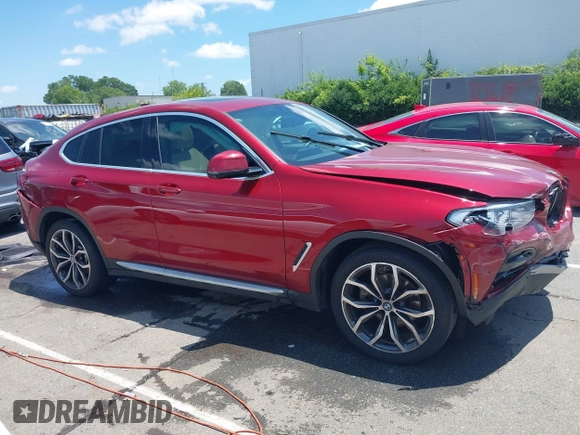 2021 BMW X4 xDrive30i with VIN 5UX2V1C07M9F59530, listed as a IAAI auction lot 42484957 with Not provided miles and . Bid and sale history available at DreamBid. Image 13.