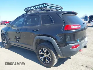 2015 Jeep Cherokee Trailhawk with VIN 1C4PJMBS5FW577470, listed as a IAAI auction lot 41565837 with 191,105 mi miles. Bid and sale history available at carsss.com. Image 3.