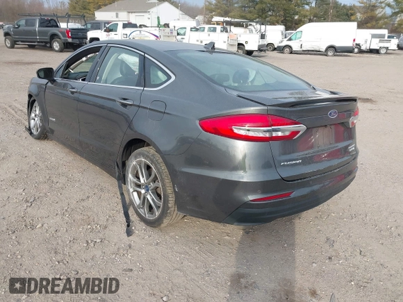 2019 Ford Fusion Hybrid Titanium with VIN 3FA6P0RU9KR158129, listed as a IAAI auction lot 41717104 with 37,736 mi miles. Bid and sale history available at carsss.com. Image 3.