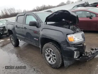 2022 GMC Canyon 4WD AT4 w/Cloth with VIN 1GTG6FENXN1264798, listed as a Copart auction lot 83303824 with 0 mi miles and Salvage Title. Bid and sale history available at carsss.com. Image 4.