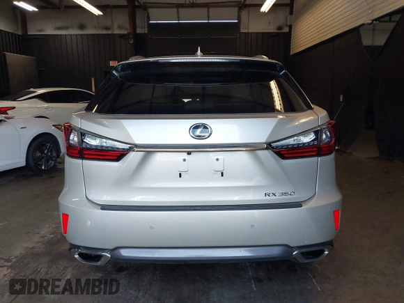 2017 Lexus RX 350 z VIN 2T2BZMCAXHC064652, wystawiony jako IAAI lot #42524586 z przebiegiem 70 702 mil mil oraz . Historia ofert i sprzedaży dostępna na DreamBid. Obrazek 16.