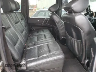 2002 Mercedes-Benz G-Class with VIN WDCYR49E22X128940, listed as a Copart auction lot 46860805 with 255,319 mi miles and Clean Title. Bid and sale history available at carsss.com. Image 11.