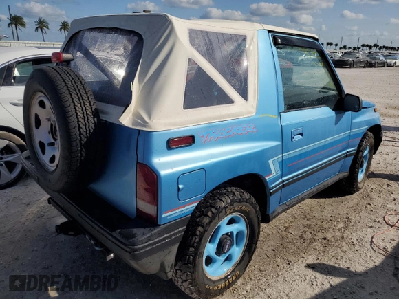 1994 Geo Tracker z VIN 2CNBE18U0R6940807, wystawiony jako Copart lot #78071244 z przebiegiem 116 472 mil mil oraz Nie do naprawy. Historia ofert i sprzedaży dostępna na DreamBid. Obrazek 3.