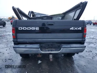 1999 Dodge Ram 2500 with VIN 1B7KF2367XJ653030, listed as a Copart auction lot 87110154 with 0 mi miles and Salvage Title. Bid and sale history available at carsss.com. Image 6.