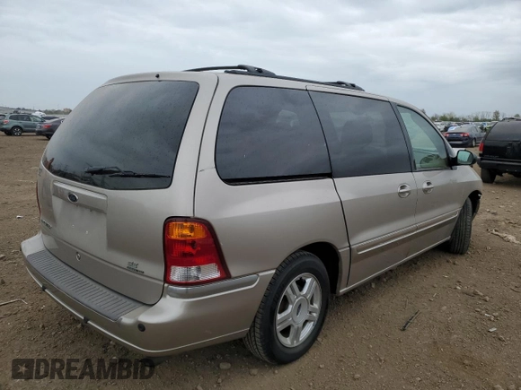 2003 Ford Windstar SE with VIN 2FMDA52413BB59104, listed as a Copart auction lot 55134805 with 132,918 mi miles and Salvage title. Bid and sale history available at DreamBid. Image 3.