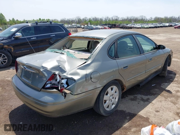2003 Ford Taurus LX Standard with VIN 1FAFP52U63A235154, listed as a IAAI auction lot 42084426 with 162,497 mi miles and . Bid and sale history available at DreamBid. Image 4.