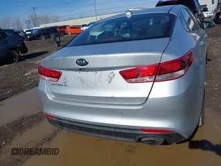 2016 Kia Optima LX with VIN 5XXGT4L34GG078857, listed as a IAAI auction lot 41819971 with 112,963 mi miles. Bid and sale history available at carsss.com. Image 16.