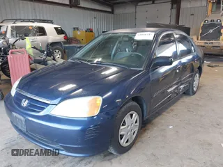2003 Honda Civic LX with VIN 2HGES16583H529254, listed as a IAAI auction lot 42010247 with 238,517 mi miles. Bid and sale history available at carsss.com. Image 2.