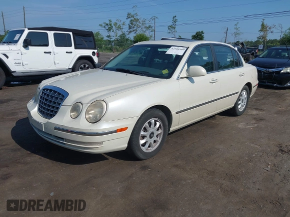 2004 Kia Amanti z VIN KNALD124145015796, wystawiony jako IAAI lot #42308909 z przebiegiem 111 156 mil mil oraz . Historia ofert i sprzedaży dostępna na DreamBid. Obrazek 2.