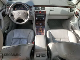 2001 Mercedes-Benz E-Class AWD with VIN WDBJH82J81X052002, listed as a Copart auction lot 82832724 with 187,464 mi miles and Salvage Title. Bid and sale history available at carsss.com. Image 8.