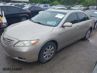 2008 Toyota Camry LE with VIN 4T1BK46KX8U574706, listed as a IAAI auction lot 41954313 with 217,899 mi miles. Bid and sale history available at carsss.com. Image 2.