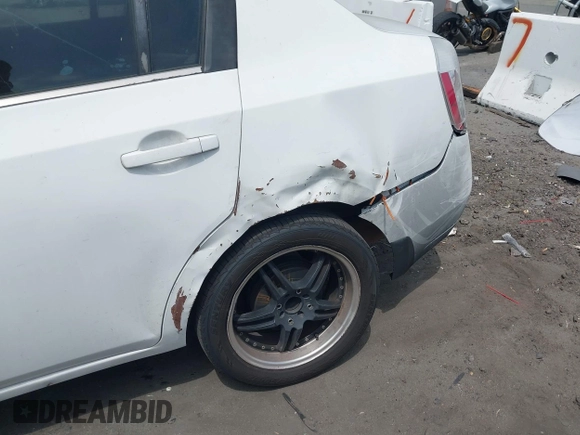 2009 Nissan Sentra S with VIN 3N1AB61E29L639804, listed as a IAAI auction lot 42074055 with 133,358 mi miles and . Bid and sale history available at DreamBid. Image 6.