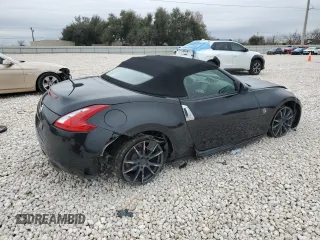 2014 Nissan 370Z Touring with VIN JN1AZ4FH1EM620177, listed as a Copart auction lot 42581255 with 106,957 mi miles and Salvage Title. Bid and sale history available at DreamBid. Image 3.