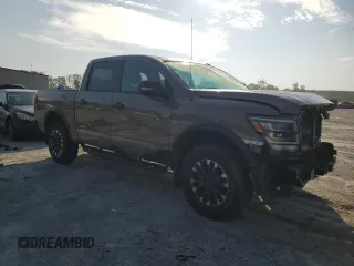 2021 Nissan Titan Pro-4X with VIN 1N6AA1ED0MN507652, listed as a Copart auction lot 62156505 with 13,085 mi miles and Salvage title. Bid and sale history available at DreamBid. Image 4.
