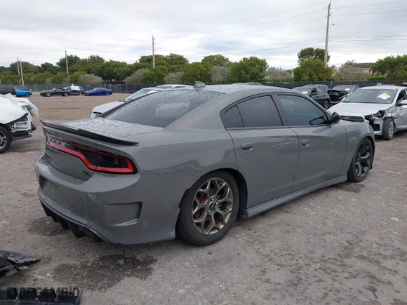 2018 Dodge Charger Daytona with VIN 2C3CDXCT2JH188523, listed as a IAAI auction lot 41351342 with 127,127 mi miles. Bid and sale history available at carsss.com. Image 4.