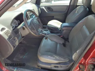 2007 Ford Escape Hybrid z VIN 1FMCU59H77KA61881, wystawiony jako Copart lot #64988665 z przebiegiem 242 536 mil mil oraz Czysty tytuł • Clean title. Historia ofert i sprzedaży dostępna na DreamBid. Obrazek 7.